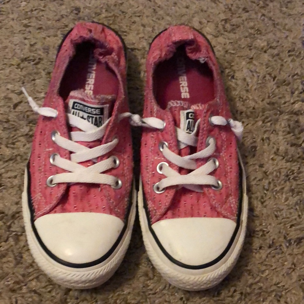 Pink converse all star sneakers.